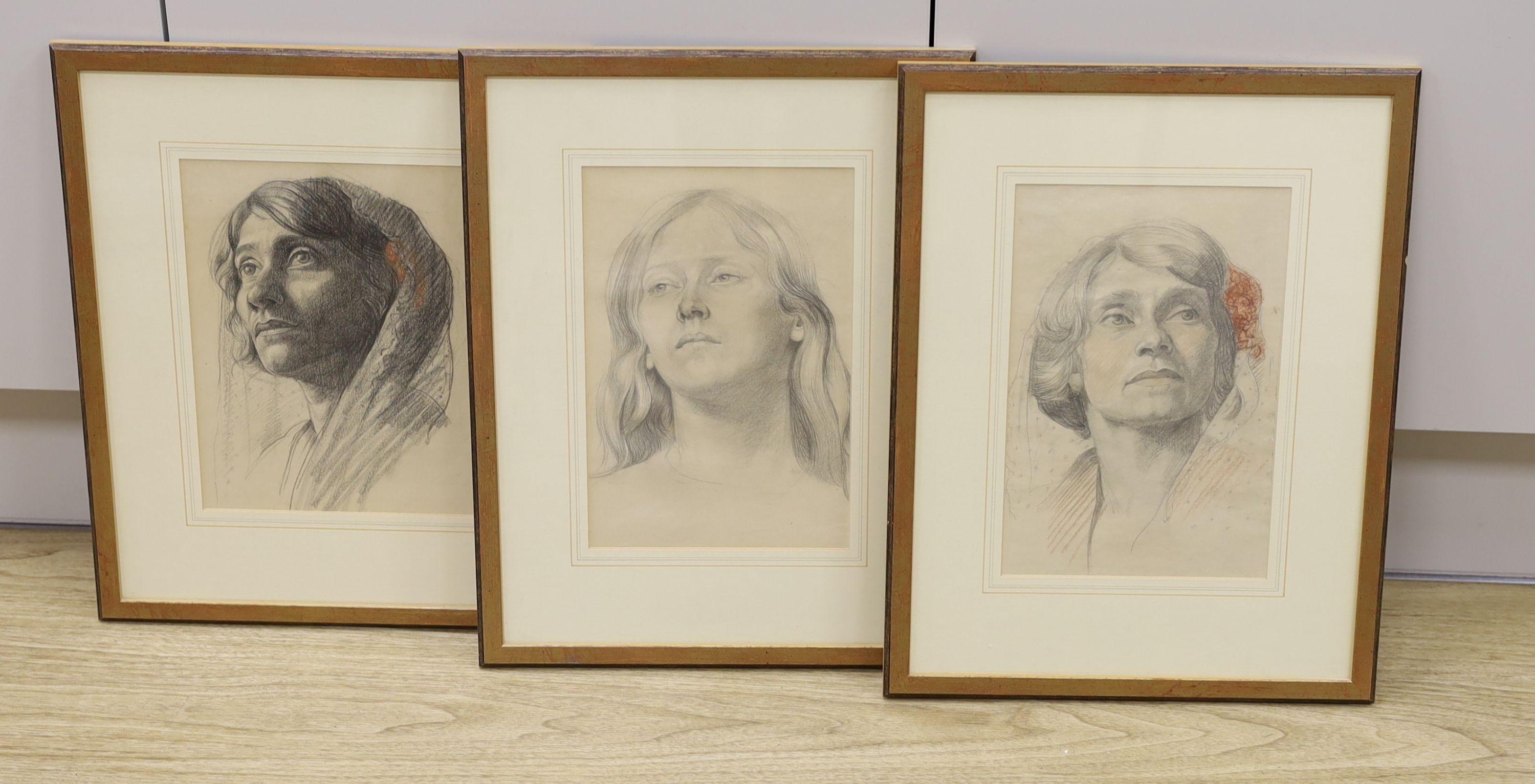 Marjorie M Sankey, three pencil and coloured chalk portraits of women, inscribed verso, largest 27 x 18cm